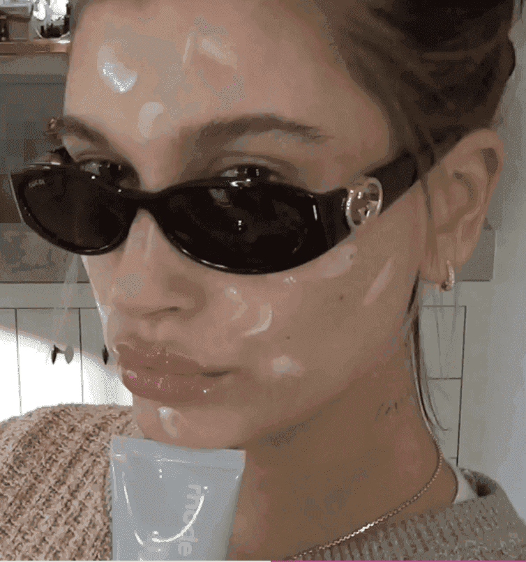 HB holding barrier butter, with a splashes of cream on her face