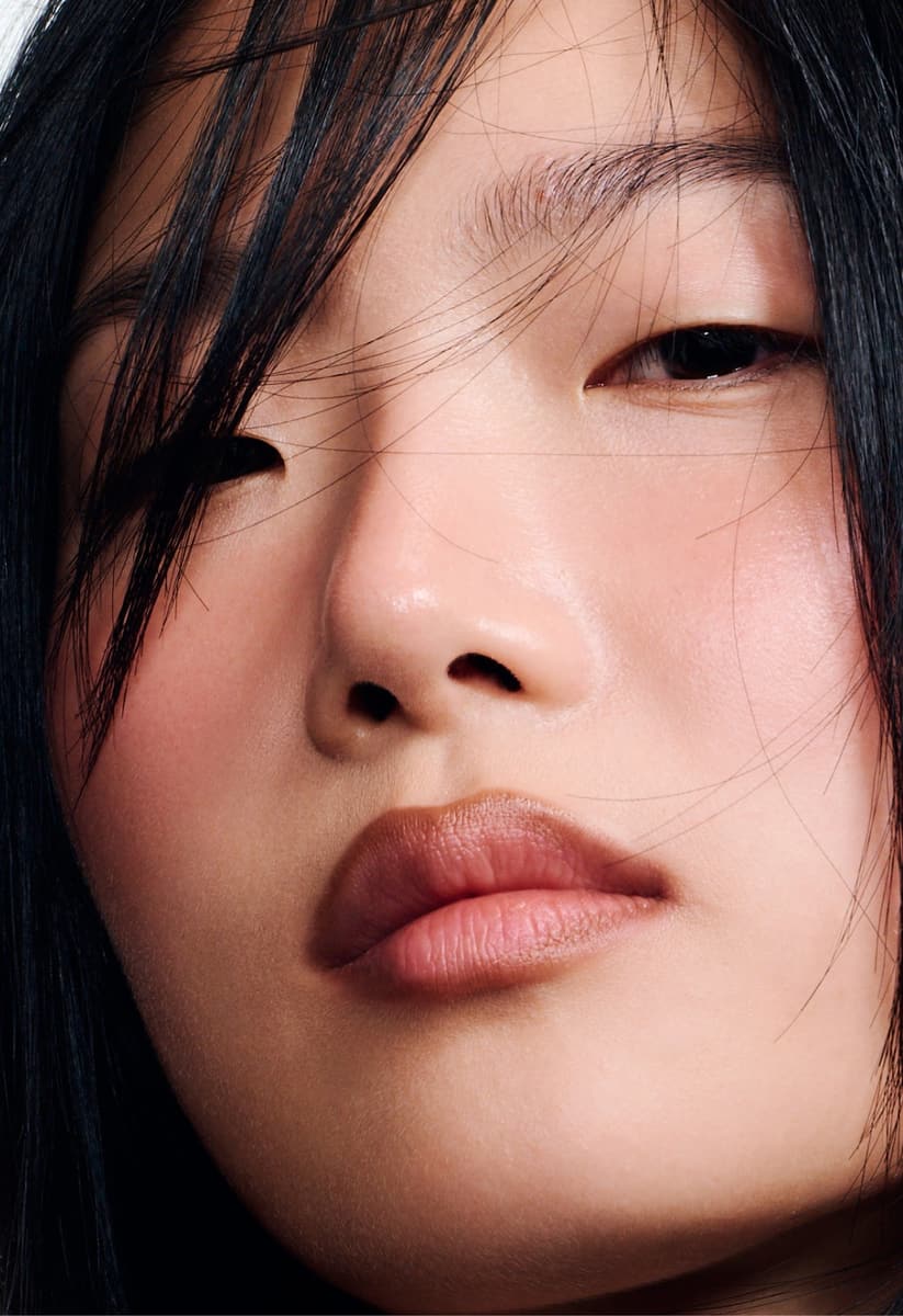 model wearing peptide lip shape in balance