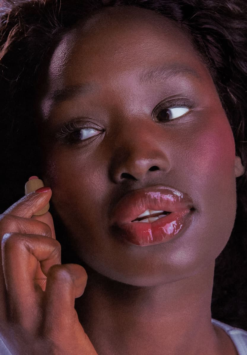 model holding a mini blush