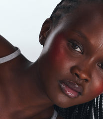 monica wears pocket blush in candy apple and peptide lip tint in sweet pea