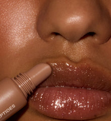 model wearing peptide lip tint sweet apple