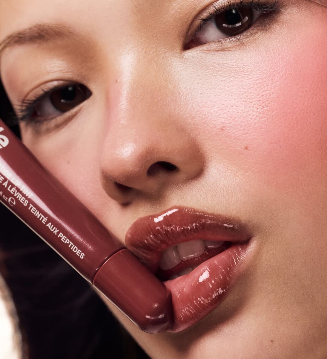 model wears peptide lip tint in pbj