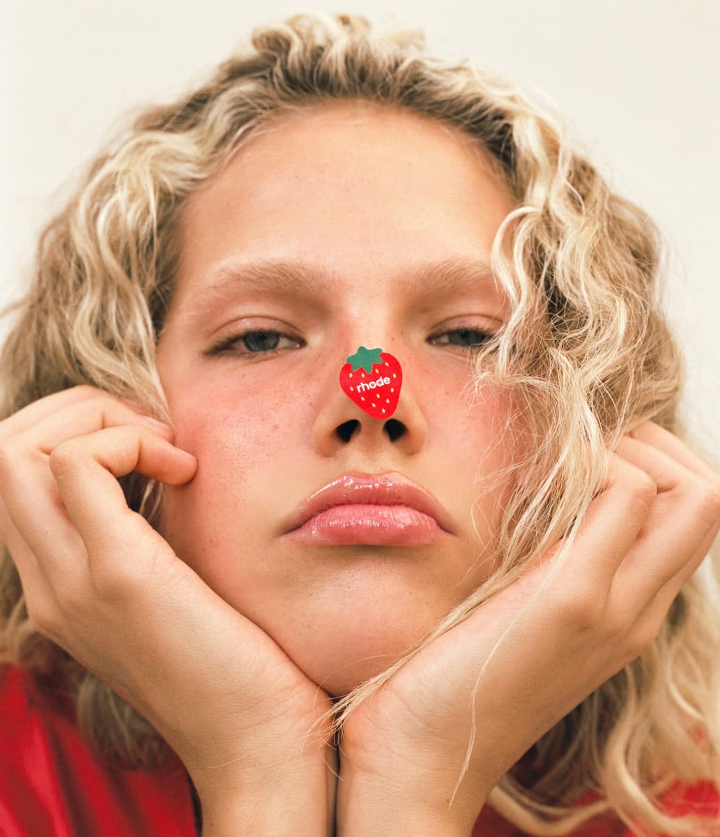 anna with rhode strawberry sticker