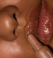 model wearing rhode sweet apple peptide lip treatment