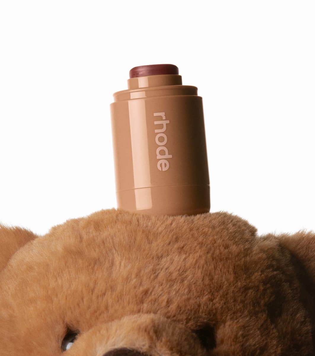 pocket blush toasted teddy on top of a teddy bear